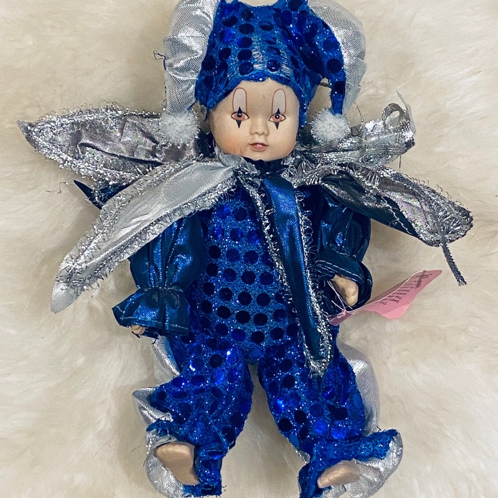 SHOW STOPPERS PORCELAIN & SEQUINS BABY JESTER